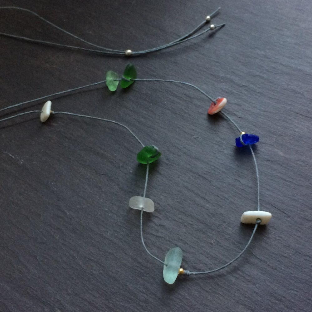 Image of Multiple beach find necklaces