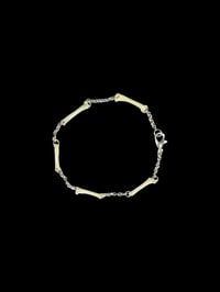 Image 1 of small cat bones bracelet
