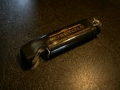 Image of Foretold Lighter with Bottle Opener