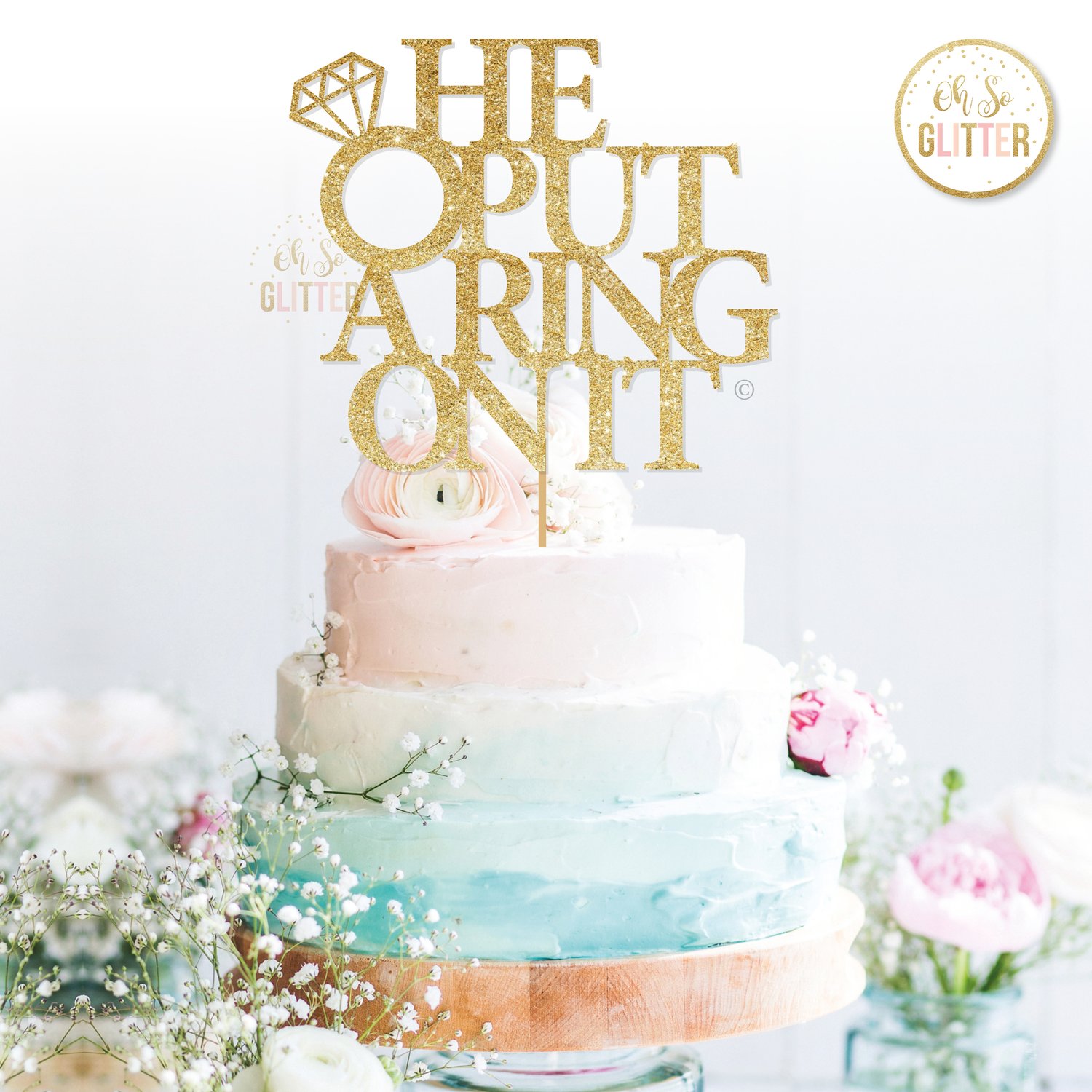 Image of He put a ring on it cake topper