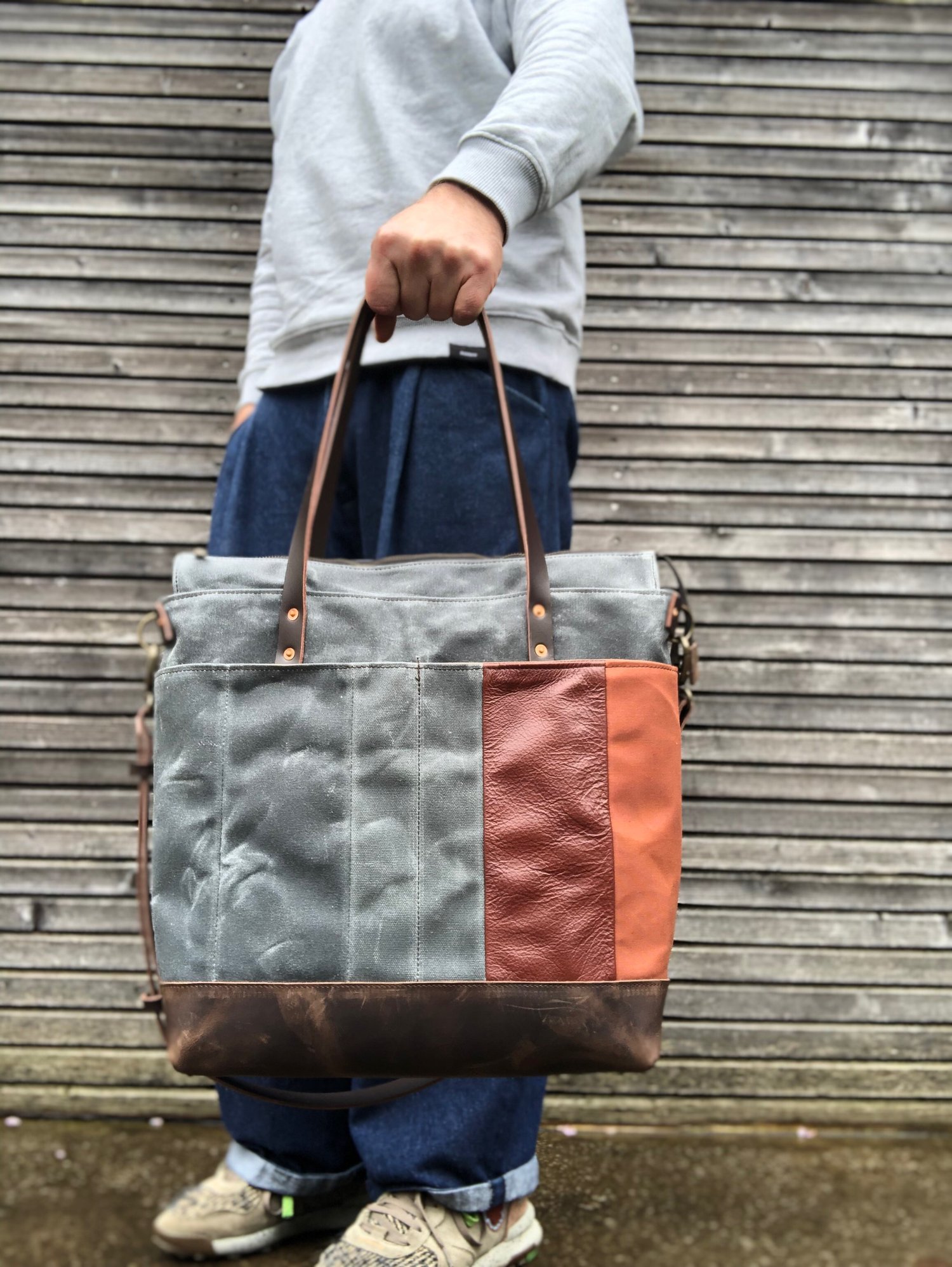 Image of Oversized tote bag in waxed canvas and leather with cross body strap COLLECTION UNISEX