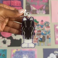 Image 12 of katseye 'monstereye v1' moveable ear keychains.