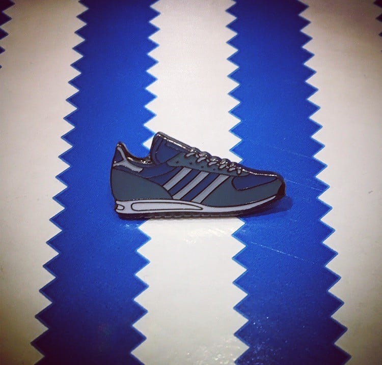 Image of SPZL TRX CLEAR GREY PIN BADGE