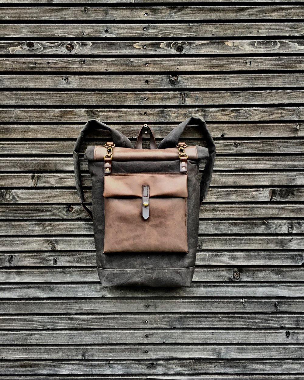 Image of Waxed canvas backpack with roll up top and oiled leather outside pocket COLLECTION UNISEX