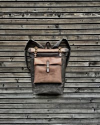 Image 1 of Waxed canvas backpack with roll up top and oiled leather outside pocket COLLECTION UNISEX