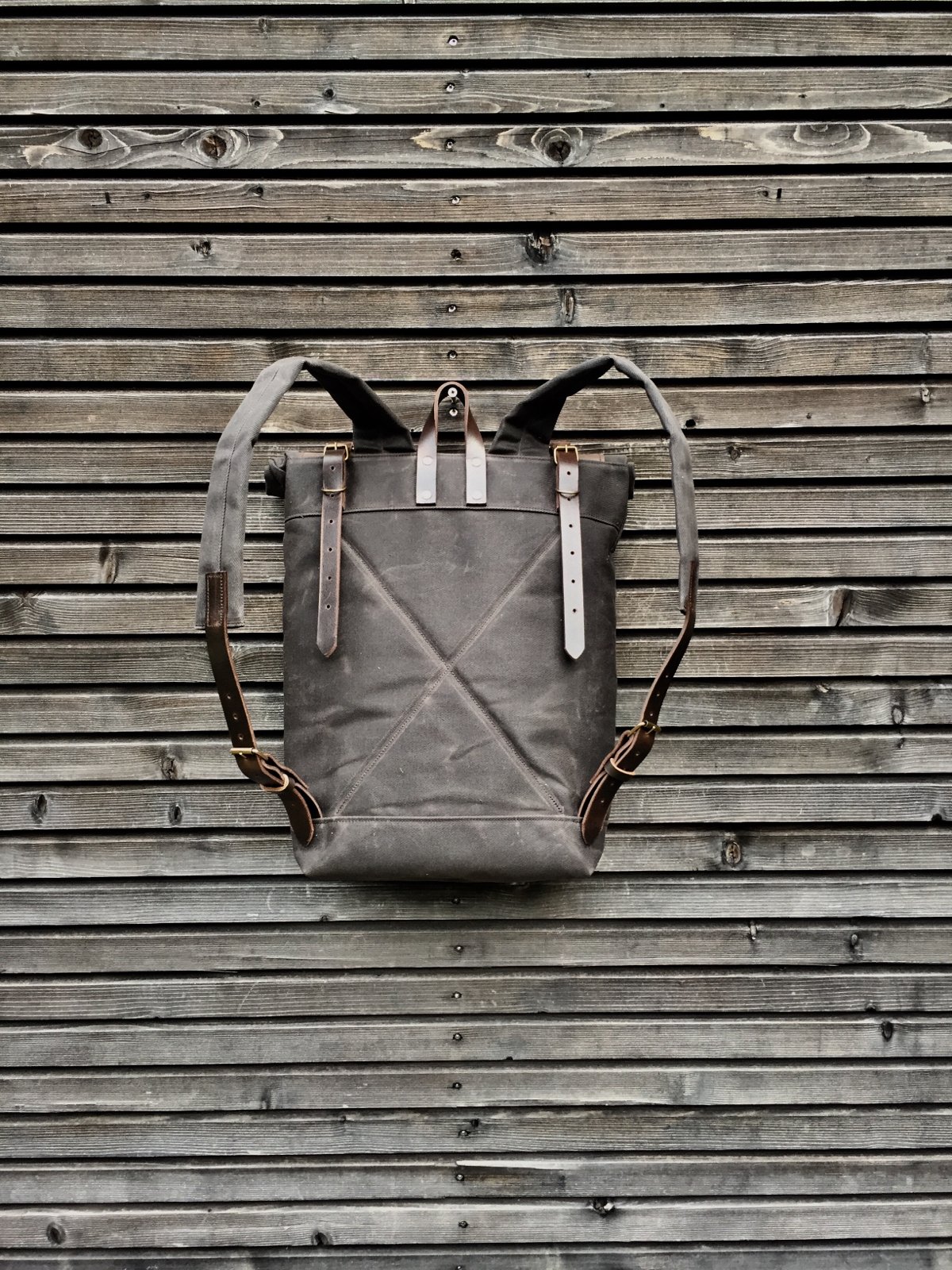 Image of Waxed canvas backpack with roll up top and oiled leather outside pocket COLLECTION UNISEX