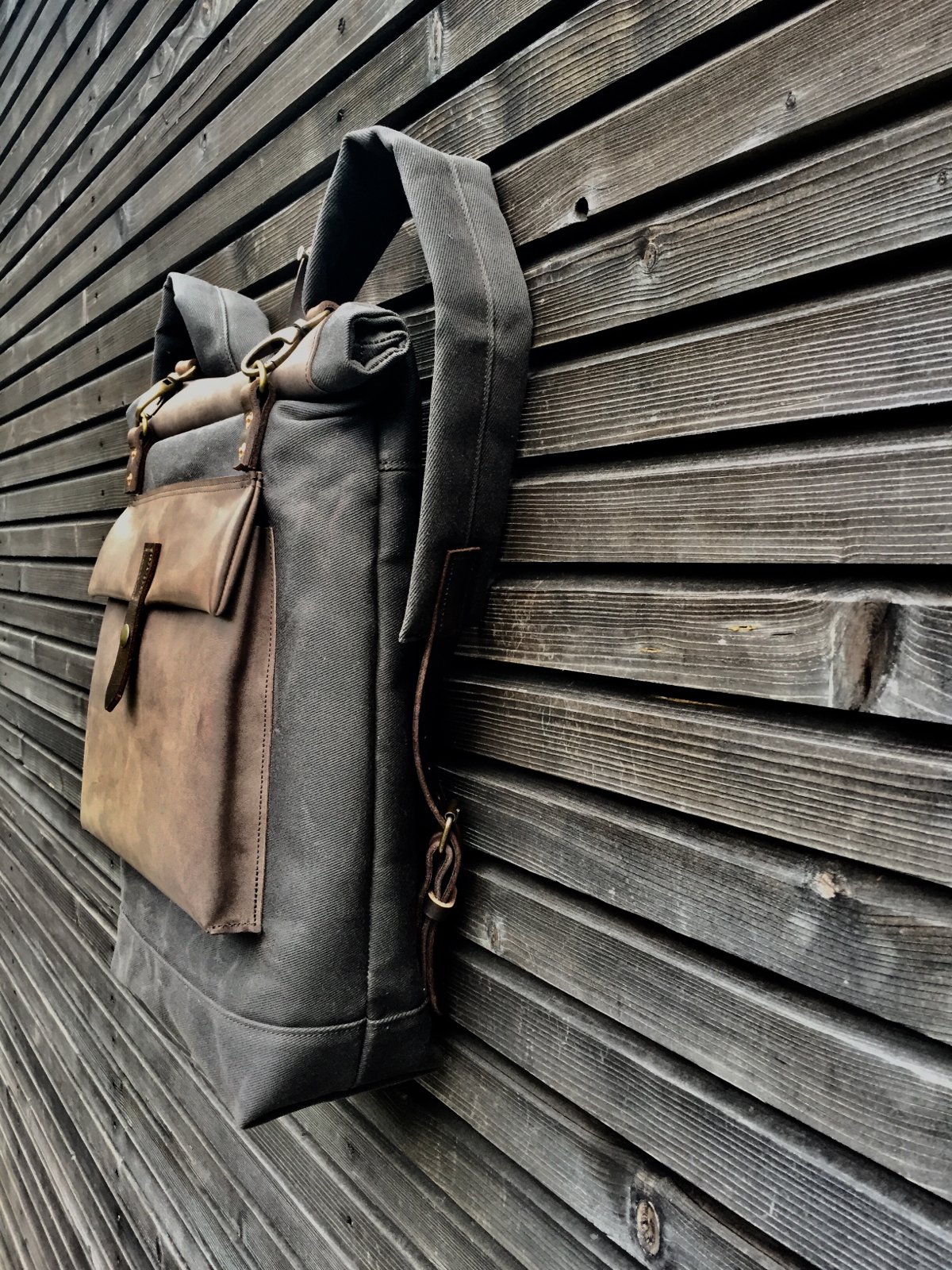 Image of Waxed canvas backpack with roll up top and oiled leather outside pocket COLLECTION UNISEX