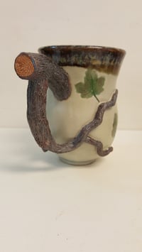 Image 1 of Tree Branch with Leaf Impressions