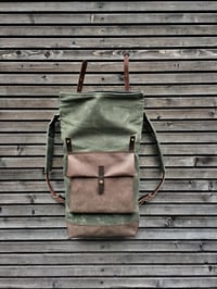 Image 3 of Waxed canvas backpack with roll to close top with leather bottom and outside pocket in dark taupe