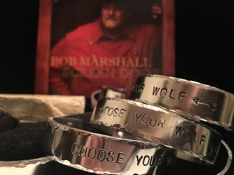 Image of "Screen Door" CD, a "Choose Your Wolf" T shirt, and Bracelet