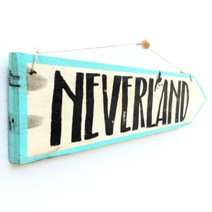 Image of Cartel flecha Neverland