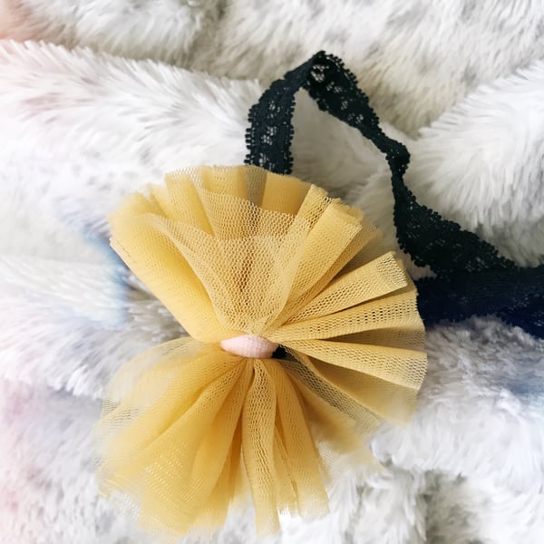 Image of the tulle-mustard bow headband