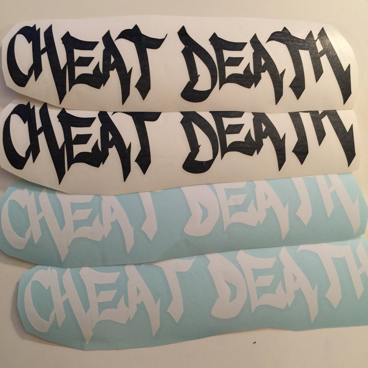 Image of Cheat Death tagger Decal