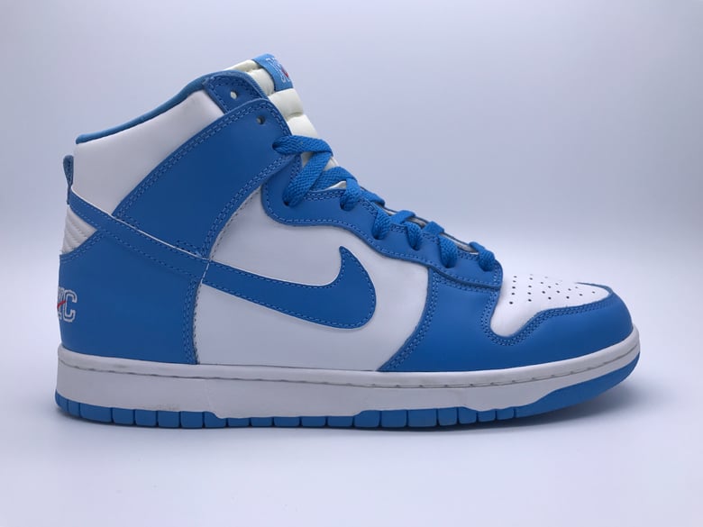 Image of NIKE DUNK HIGH LE "CAROLINA NYC"