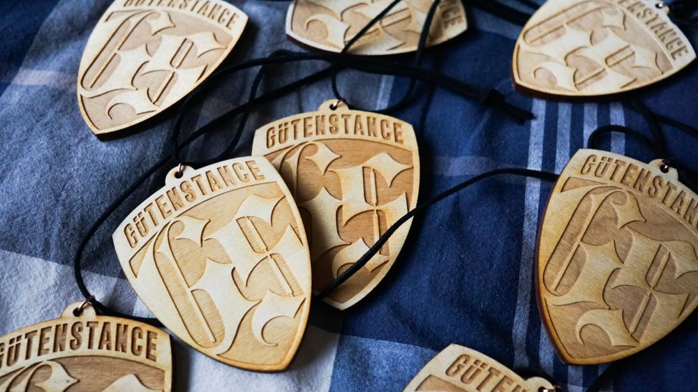 Image of shield mirror hanger