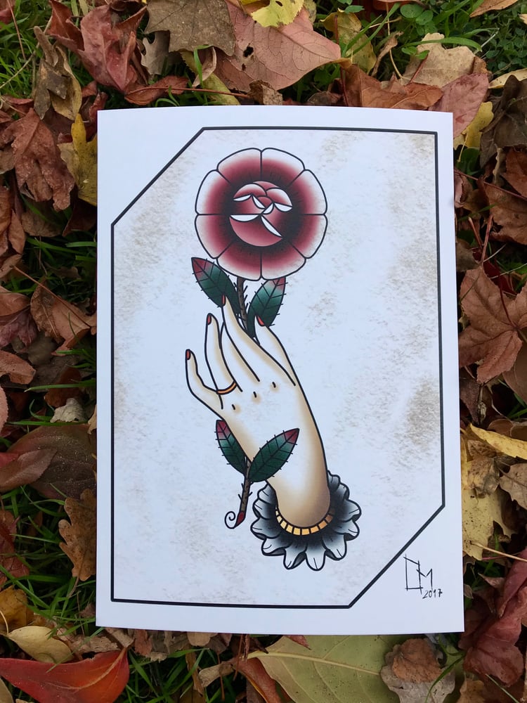 Image of Rose in hand