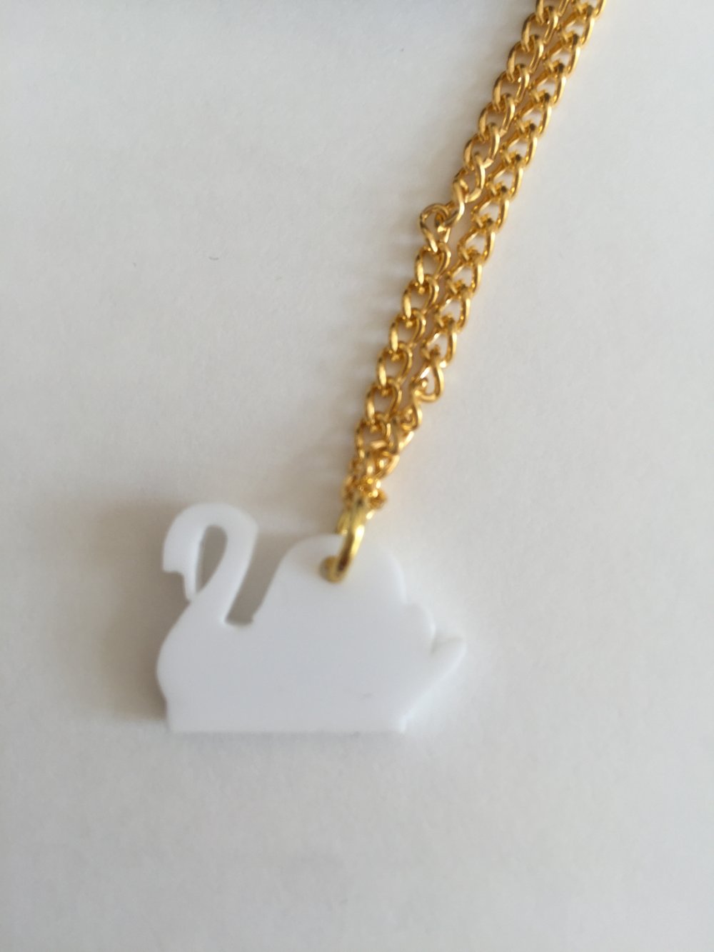 Image of LIP -  Laser cut white perspex mini swan necklace