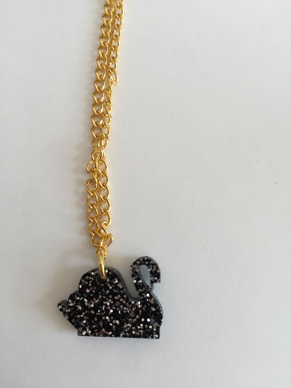 Image of LIP - Laser cut glitter perspex swan necklace