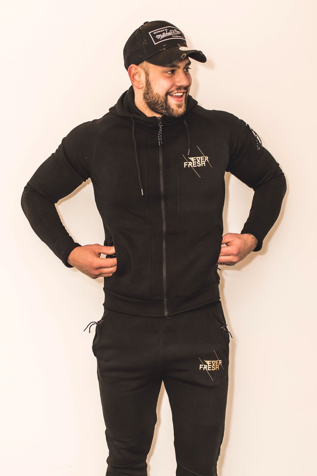 black and gold tracksuit