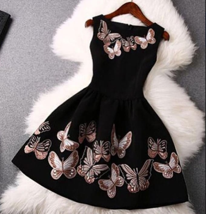 Image of Round neck sleeveless butterfly prints a large waist dress