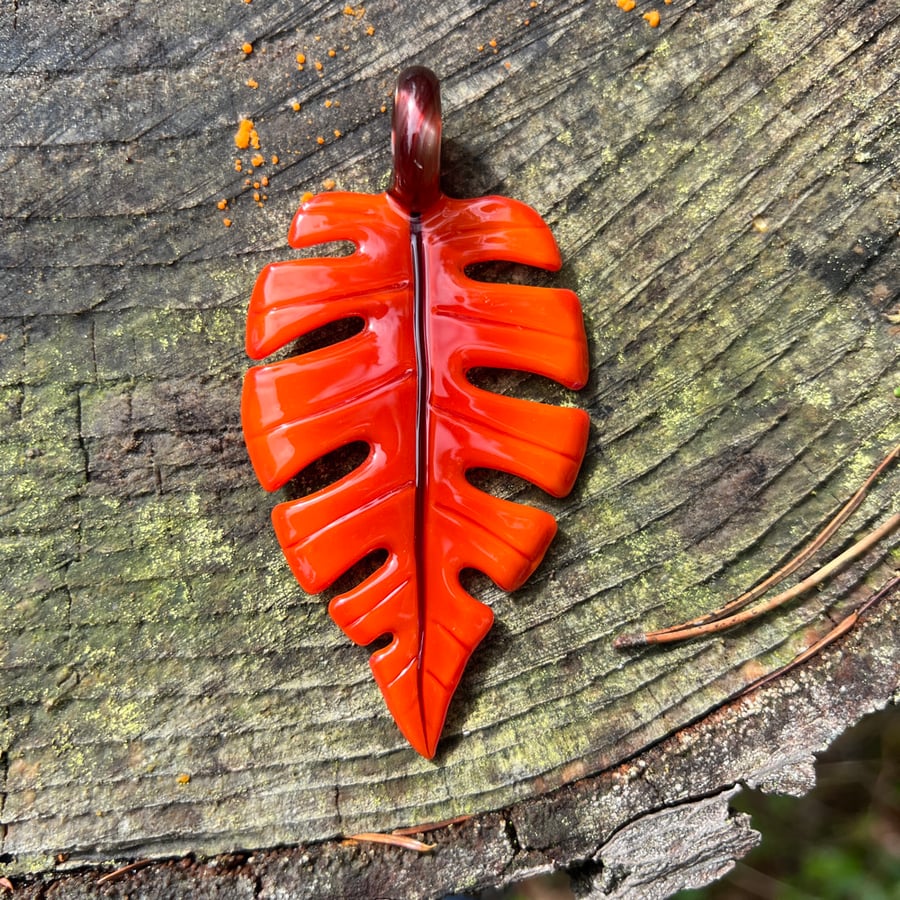 Image of Orange Sunburst Monstera Leaf Pendant