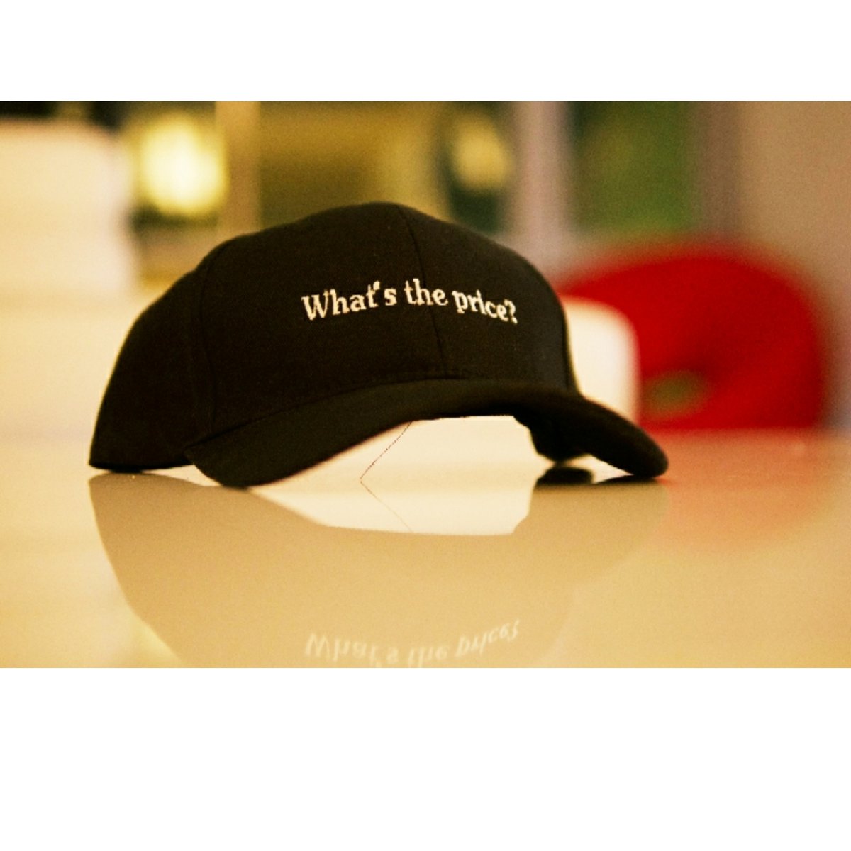 Image of no logo "What's the price?" dad hat