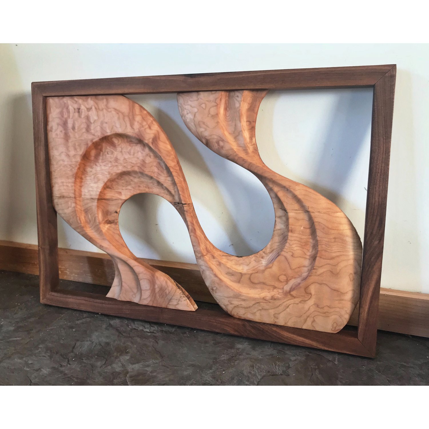 Image of Not a shell left unbroken. Quilted maple and walnut wall hanging.