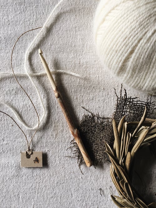 Image of size 5.5mm olive branch hand carved rustic crochet hook