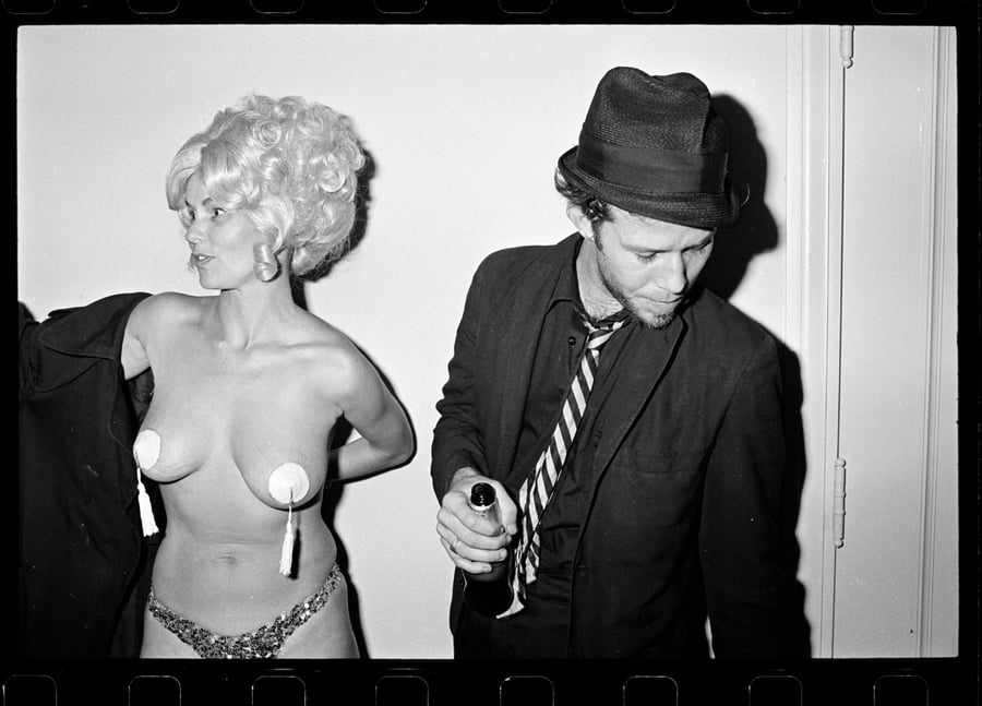 Image of Tom Waits and a burlesque dancer Los Angeles  1977