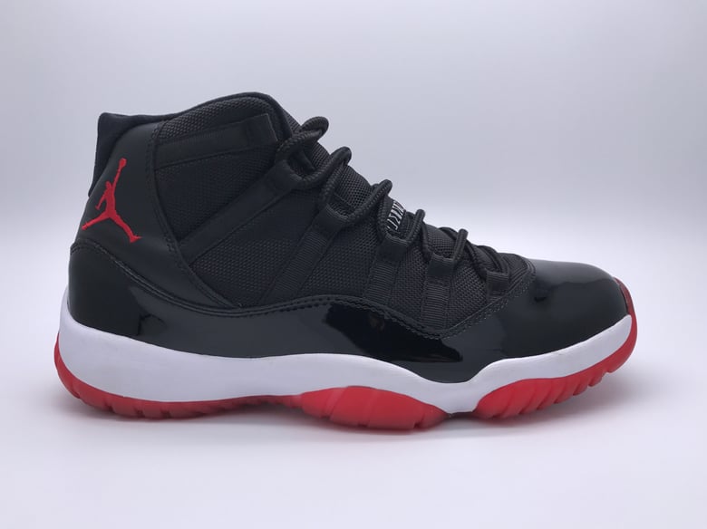 Image of AIR JORDAN 11 RETRO "BRED"