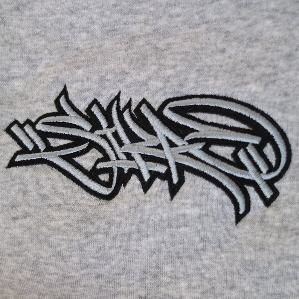 SIKA x ZENAL embroidered handstyle premium sweater