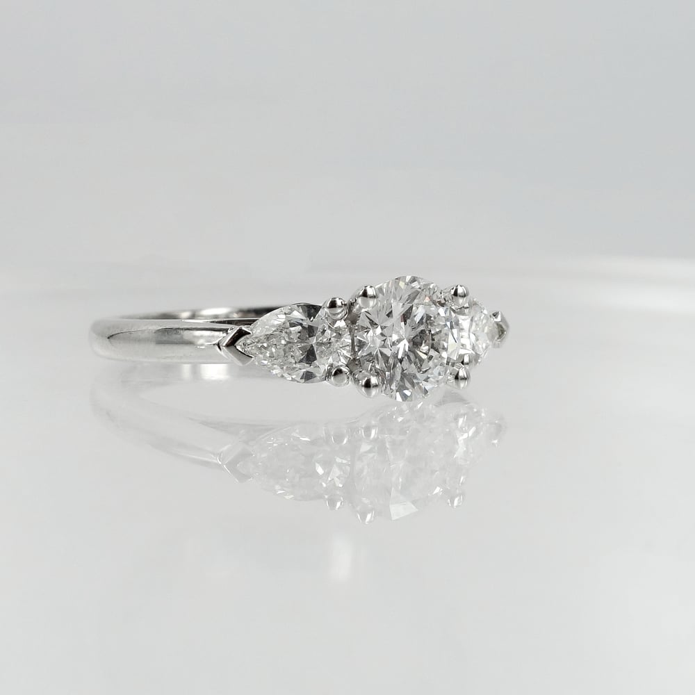 Image of 18ct White Gold Round + Pear Shape Diamond Engagement Ring