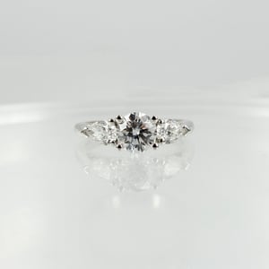 Image of 18ct White Gold Round + Pear Shape Diamond Engagement Ring