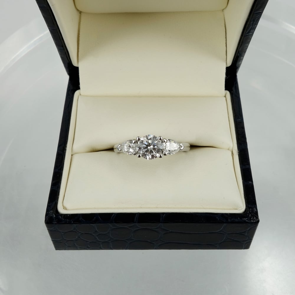 Image of 18ct White Gold Round + Pear Shape Diamond Engagement Ring