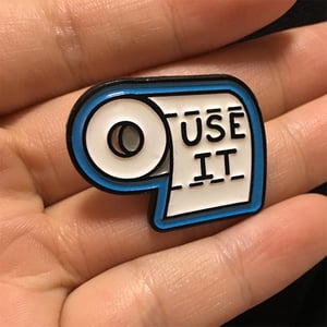 Image of UHOH Toys "USE IT" GID Enamel Pin