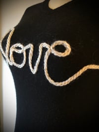 Image 3 of Upcycled “love” cursive yarn sweater in black