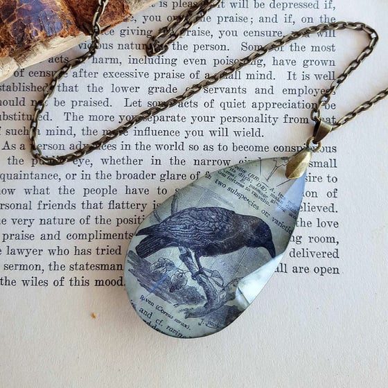 Image of Raven Antique Book Page Pendant Necklace