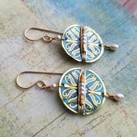 Image 1 of Tin Tin Medallion