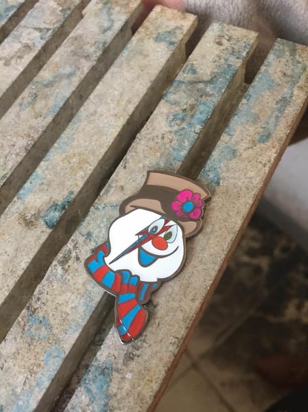 Image of Frosty Stardust 1 3/4" hard enamel pin with glitter  (spiders from Mars sold separately).