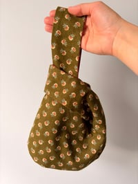 Image 1 of Green & rust knot purse | reversible 