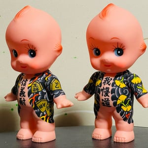 Image of tattooed kewpie by kumatora (peacock , monkies )