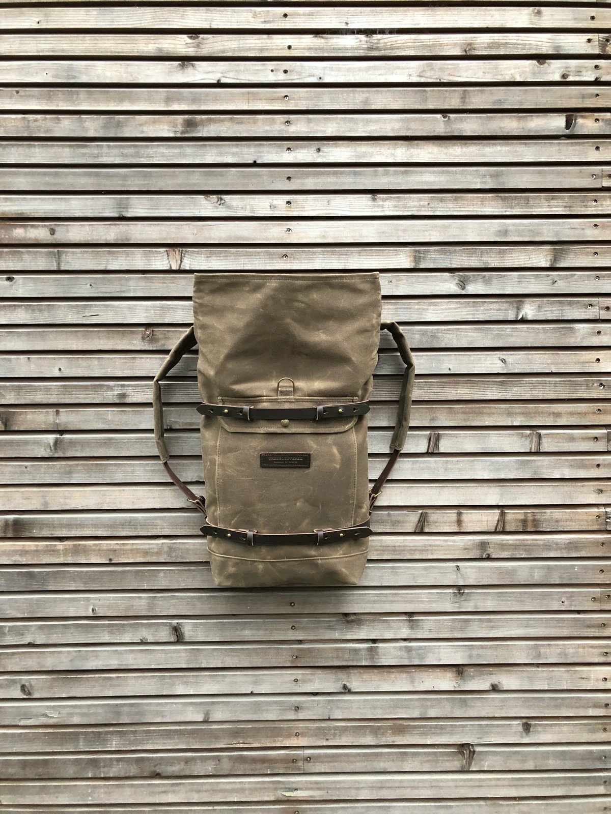 Image of Waxed canvas backpack - rucksack with folded top and waxed canvas padded shoulder straps