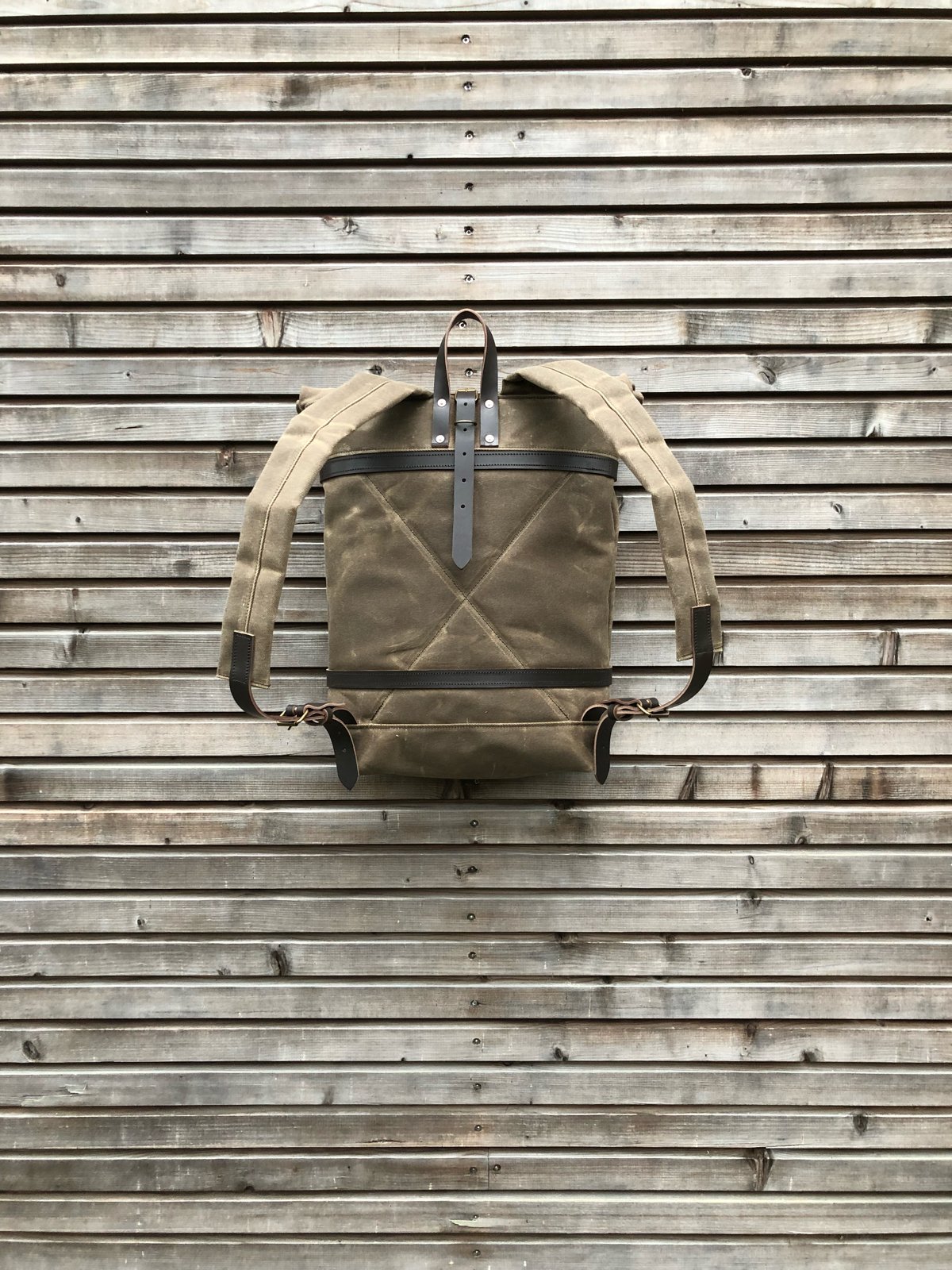 Image of Waxed canvas backpack - rucksack with folded top and waxed canvas padded shoulder straps