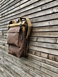 Image 2 of Leather backpack with waxed canvas roll to close top and leather front pocket