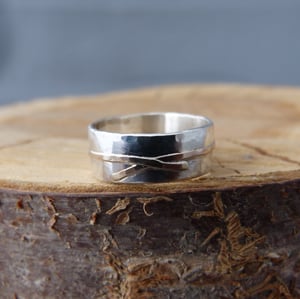 Image of Silver and gold wrapped textured ring