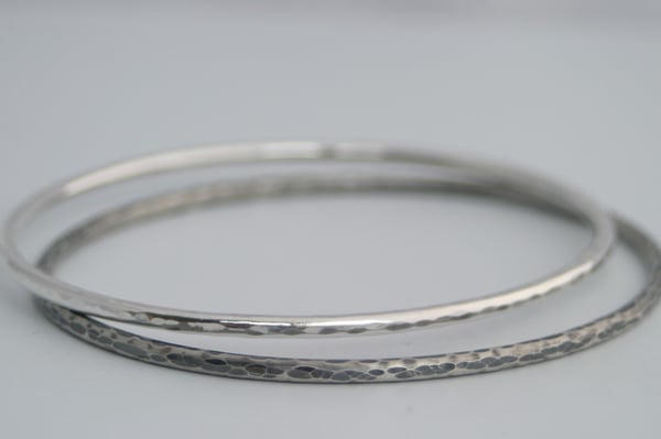 Image of Hammered silver bangles