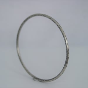 Image of Hammered silver bangles