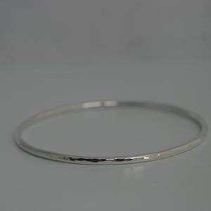 Image of Hammered silver bangles