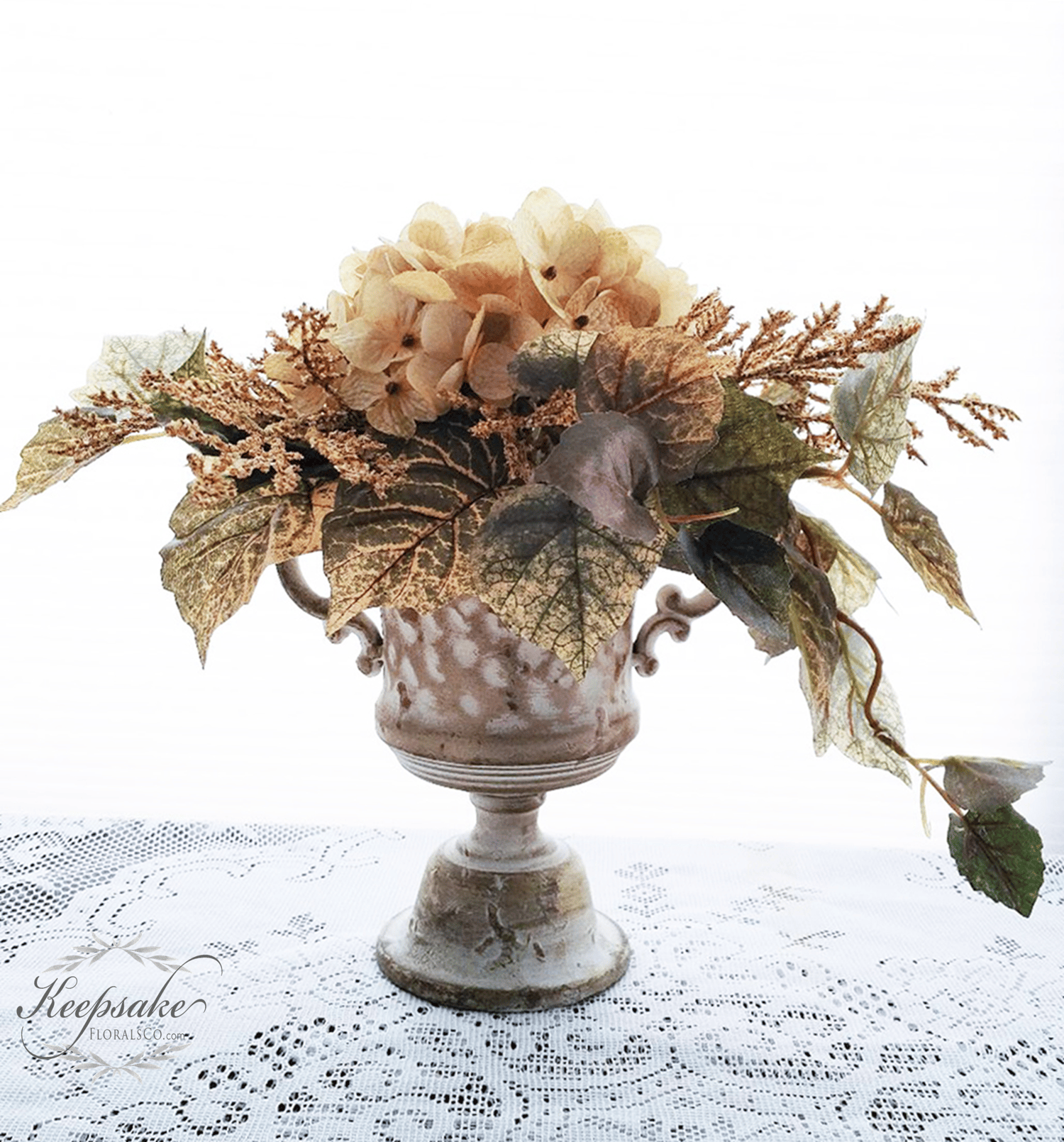 Image of Creamy Beige Hydrangea Floral Arrangement in Metal Urn Vase