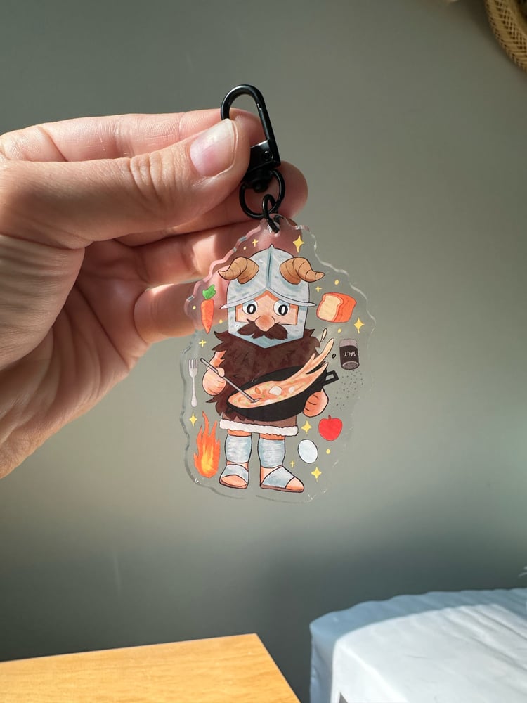 Image of Dungeon Meshi Senshi Double Sided Acrylic Keychain 2.5”